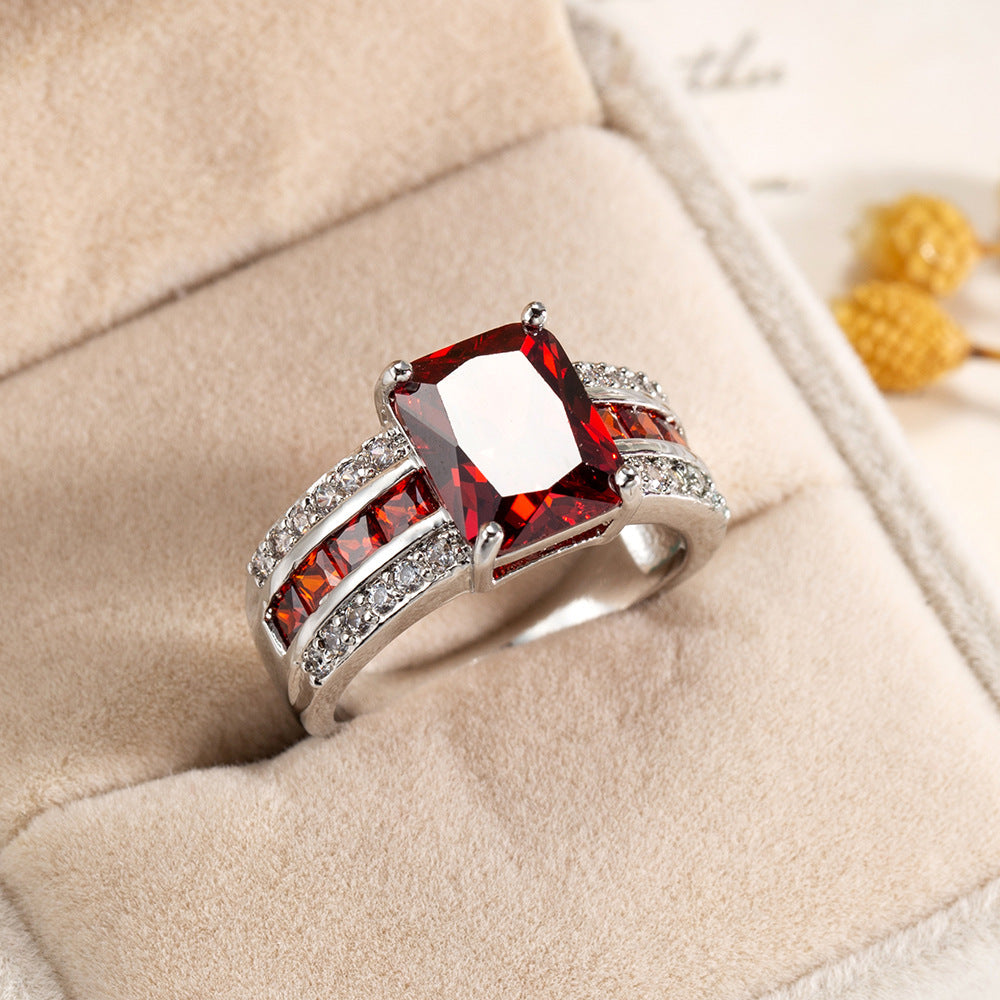 Silver-Toned Red Crystal Split-Shank Ring